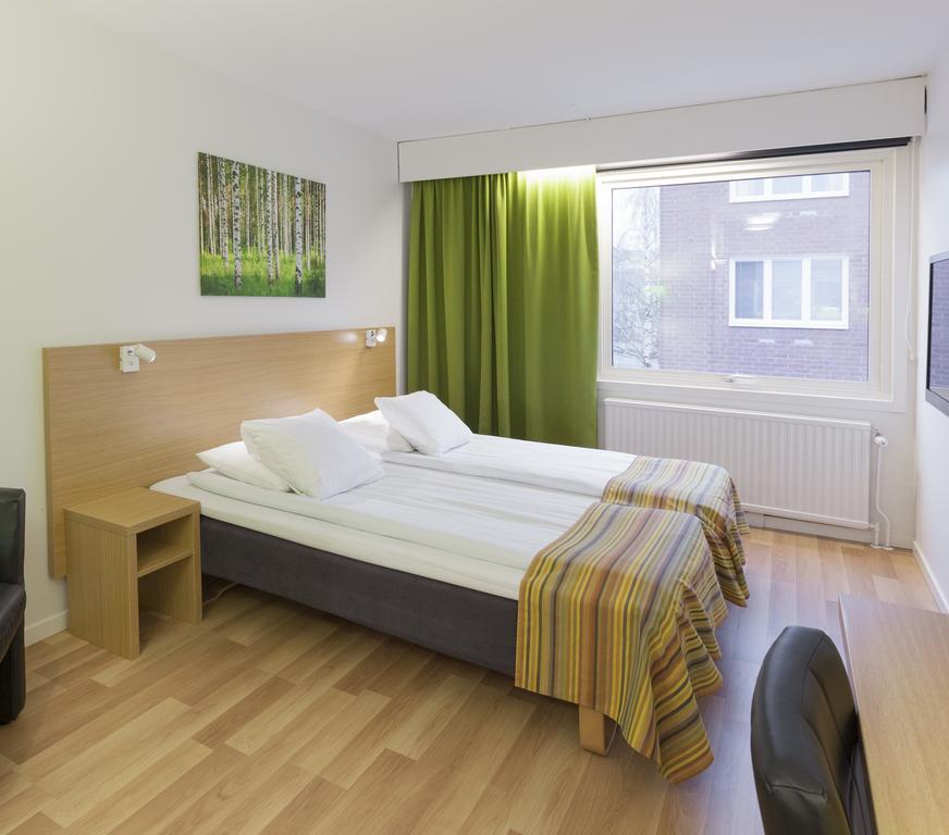 First Hotel Dragonen أوميو الغرفة الصورة
